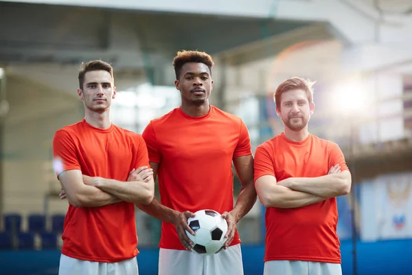 depositphotos 248214358 stock photo football team three young men